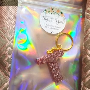 T Dark pink shimmer keychain